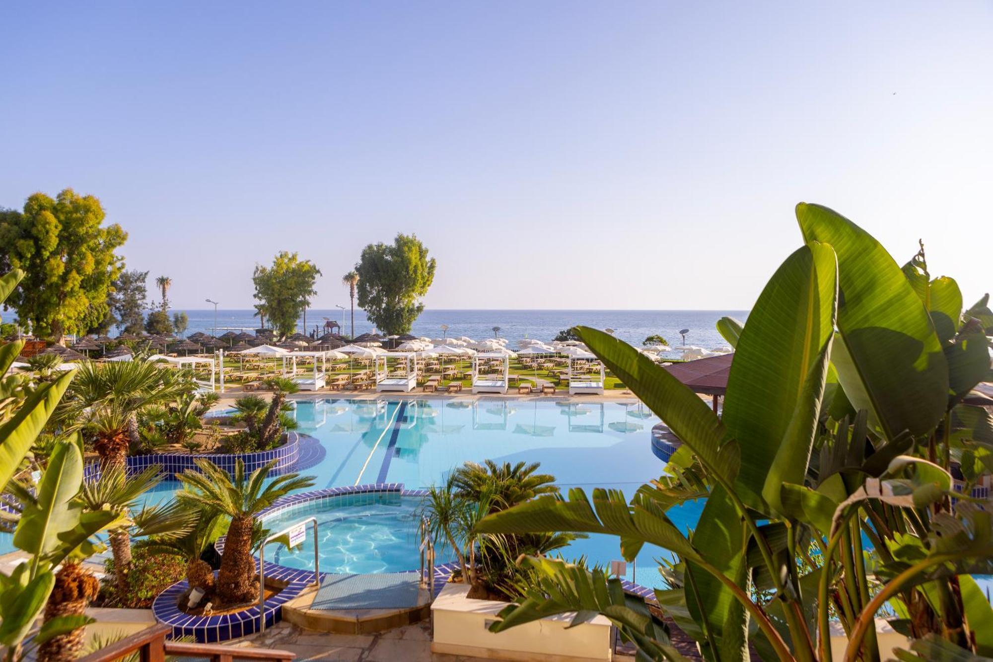Capo Bay Hotel Протарас Екстериор снимка A swimming pool at a hotel in Cyprus