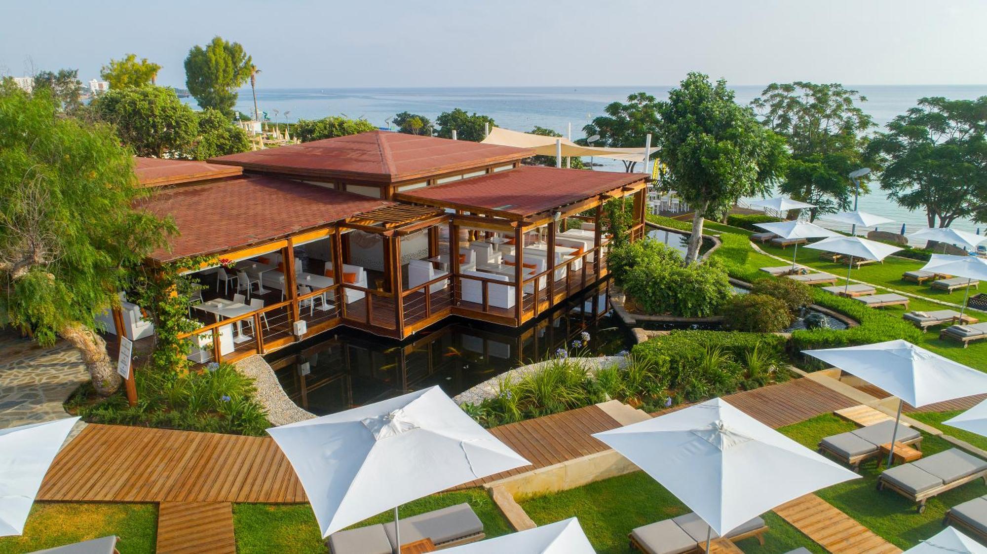 Capo Bay Hotel Протарас Екстериор снимка The resort's main restaurant